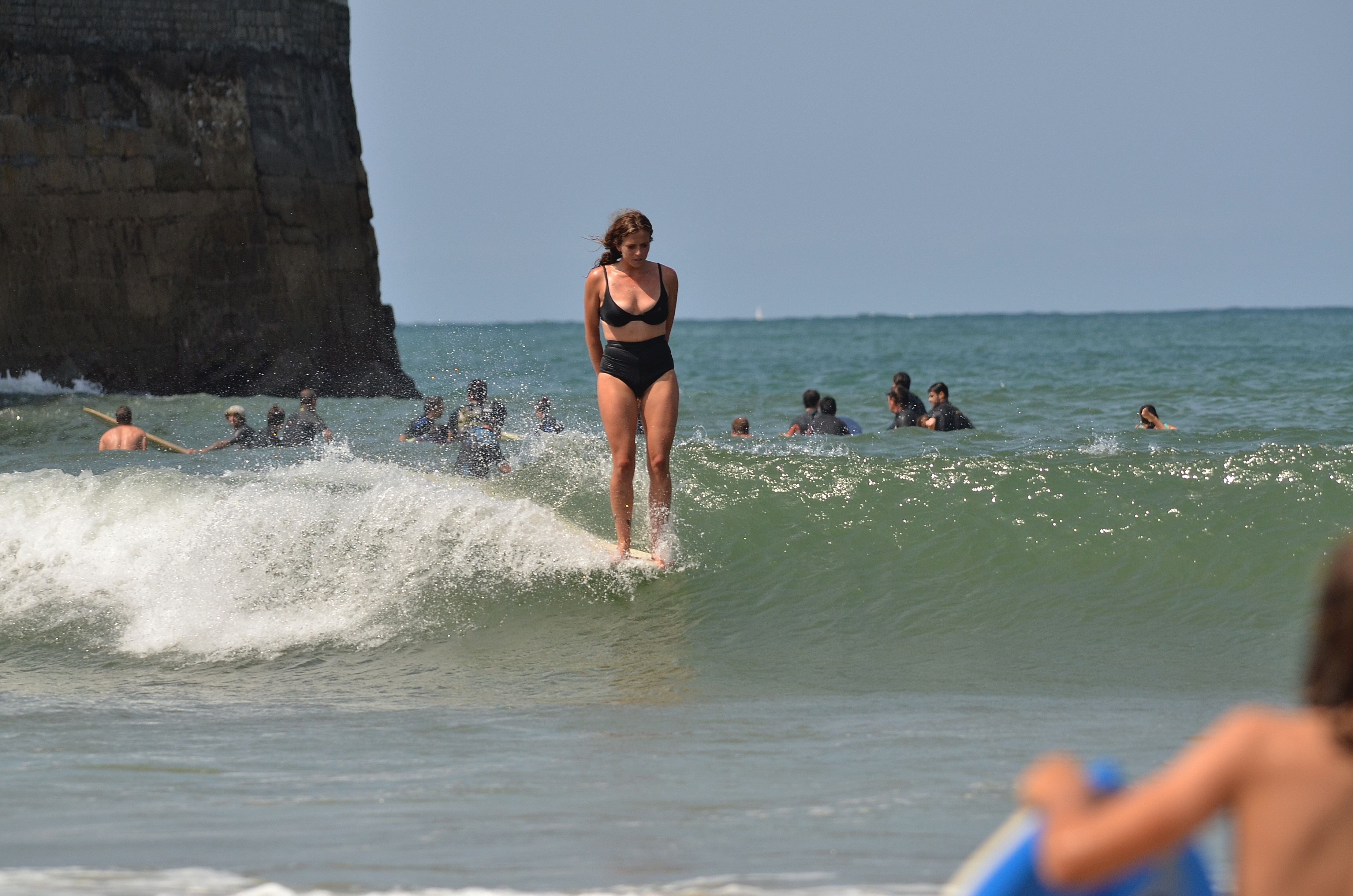 Carlota Jauregui doing a hang ten at her local beach break in Plentzia. Read the story on Alaia Surf