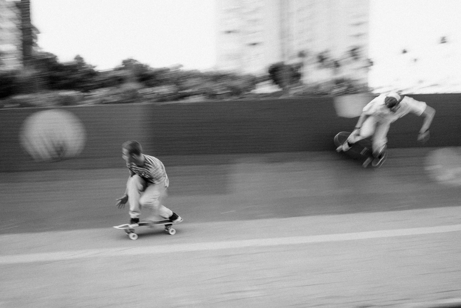 Young people surfskating YOW skates, available at Alaia Surf